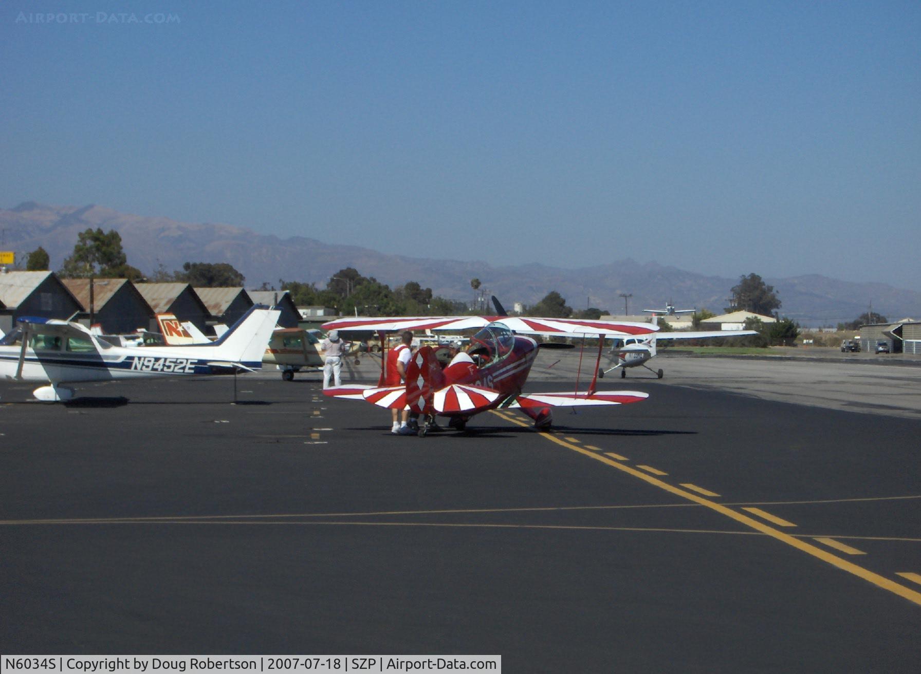 N6034S, Christen Pitts S-2B Special C/N 5132, Christen PITTS S-2B, Lycoming AEIO-540 260 Hp, preparing for dual instruction advanced aerobatics, helmet & parachutes worn