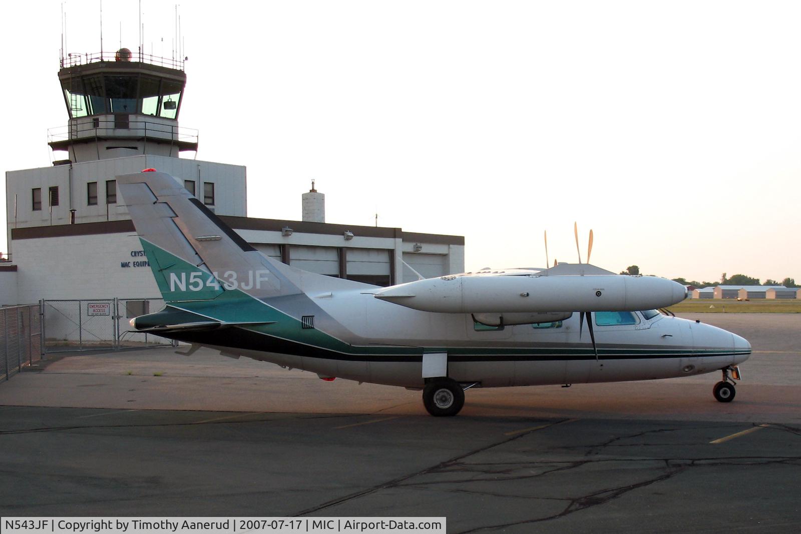 N543JF, 1979 Mitsubishi MU-2B-26A C/N 389SA, Parked at Minneapolis Crystal, Crystal tower in background