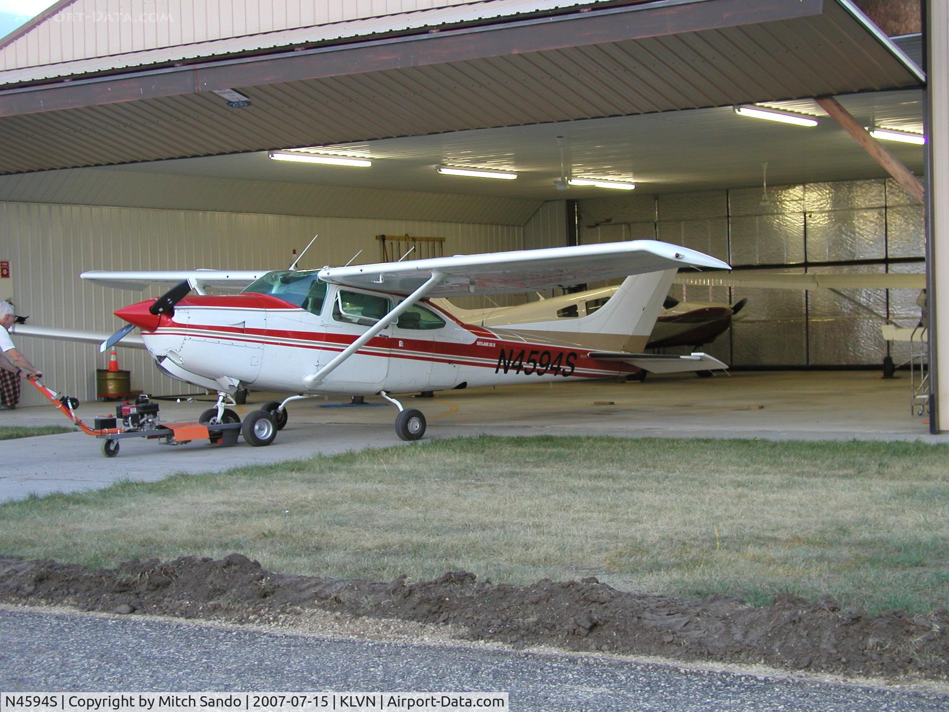 N4594S, Cessna R182 Skylane RG C/N R18201351, Cessna Turbo Skylane getting pushed into the Airlake Aero hangar.