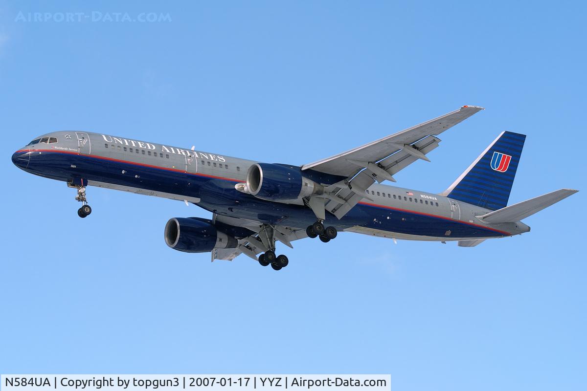 N584UA, 1993 Boeing 757-222 C/N 26706, Short final for RWY24R.