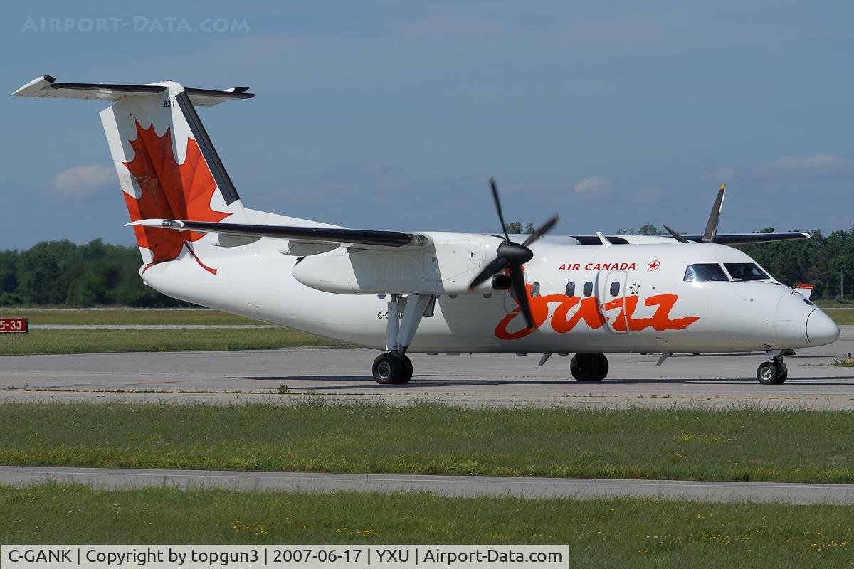 C-GANK, 1987 De Havilland Canada DHC-8-102 Dash 8 C/N 087, Taxiing on Golf