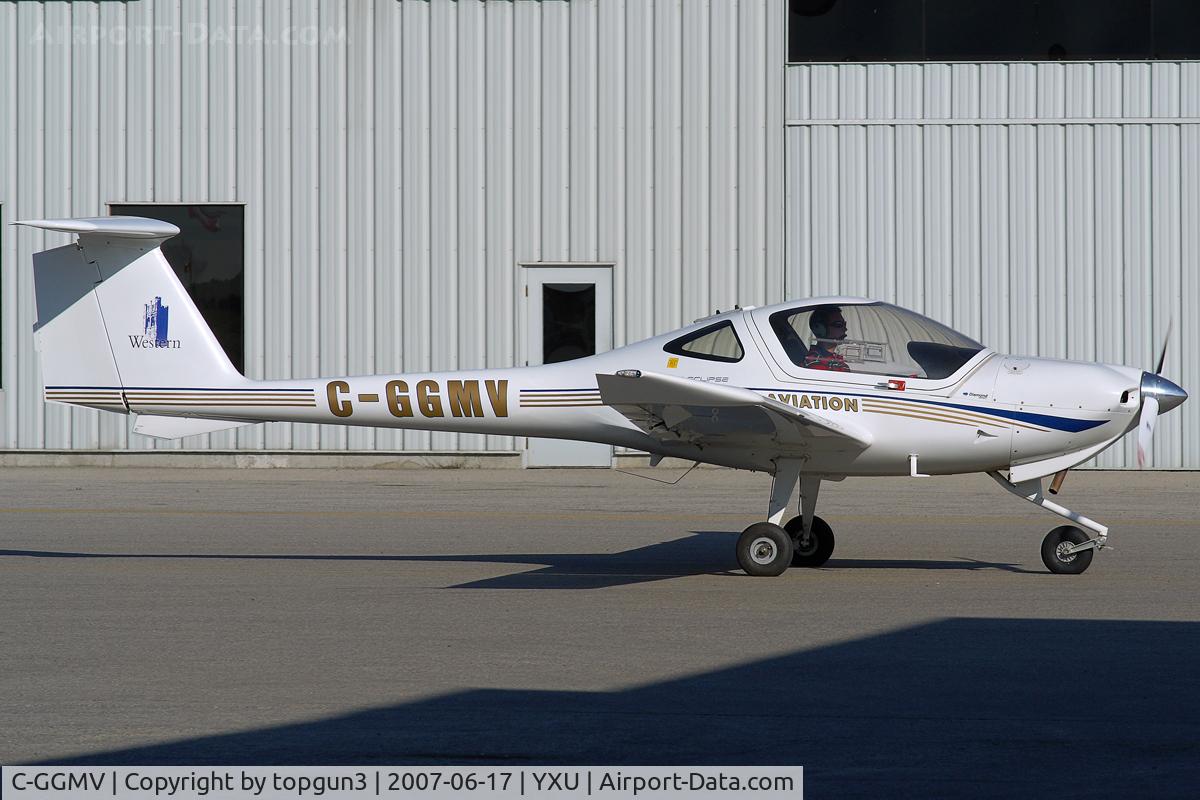 C-GGMV, 2003 Diamond DA-20C-1 Eclipse C/N C0231, Taxiing across Ramp III.