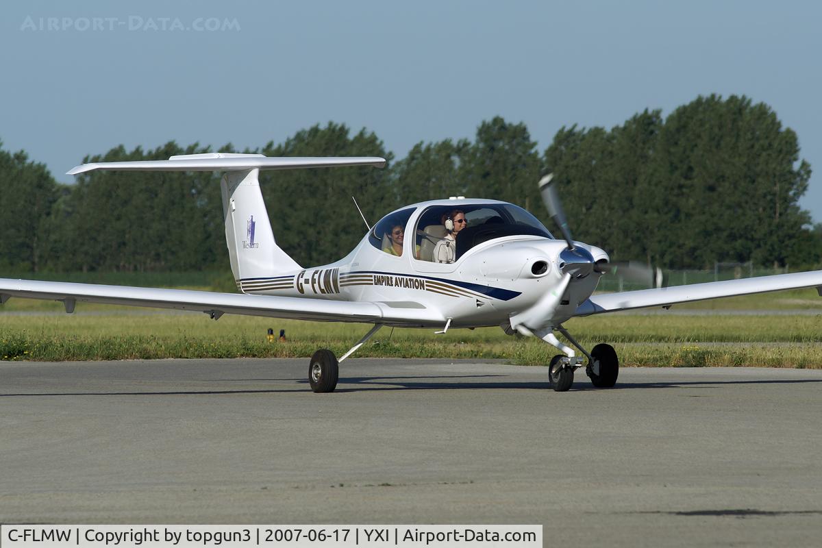 C-FLMW, 2005 Diamond DA-40 Diamond Star C/N 40.538, Taxiing on Alpha.