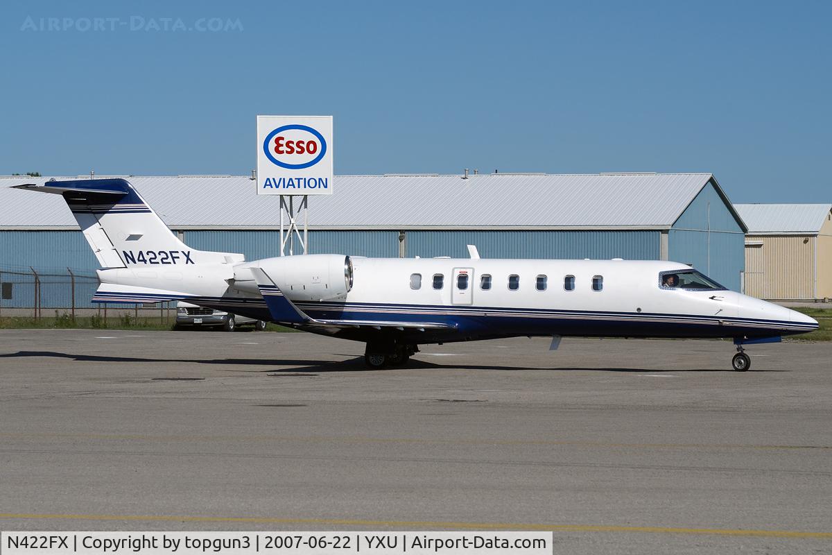 N422FX, 2001 Learjet 45 C/N 135, Taxiing across Ramp III for departure.