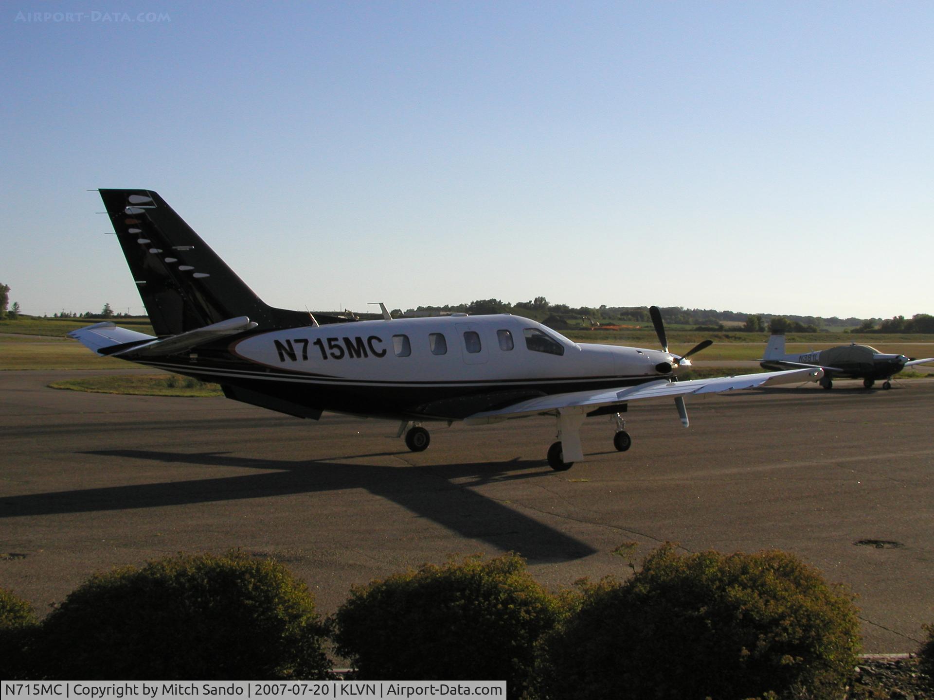 N715MC, 1991 Socata TBM-700 C/N 30, Starting up it's jet engine on the ramp at Airlake.