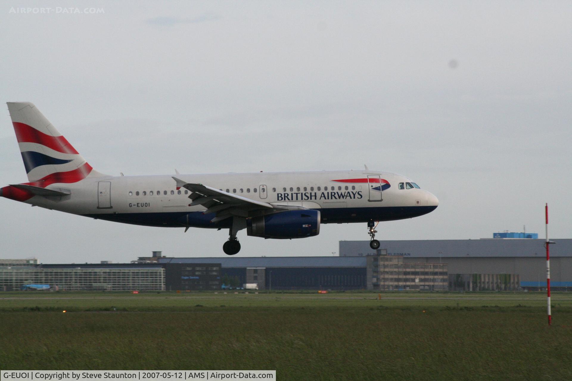 G-EUOI, 2001 Airbus A319-131 C/N 1606, Taken on a gloomy evening at Schipol