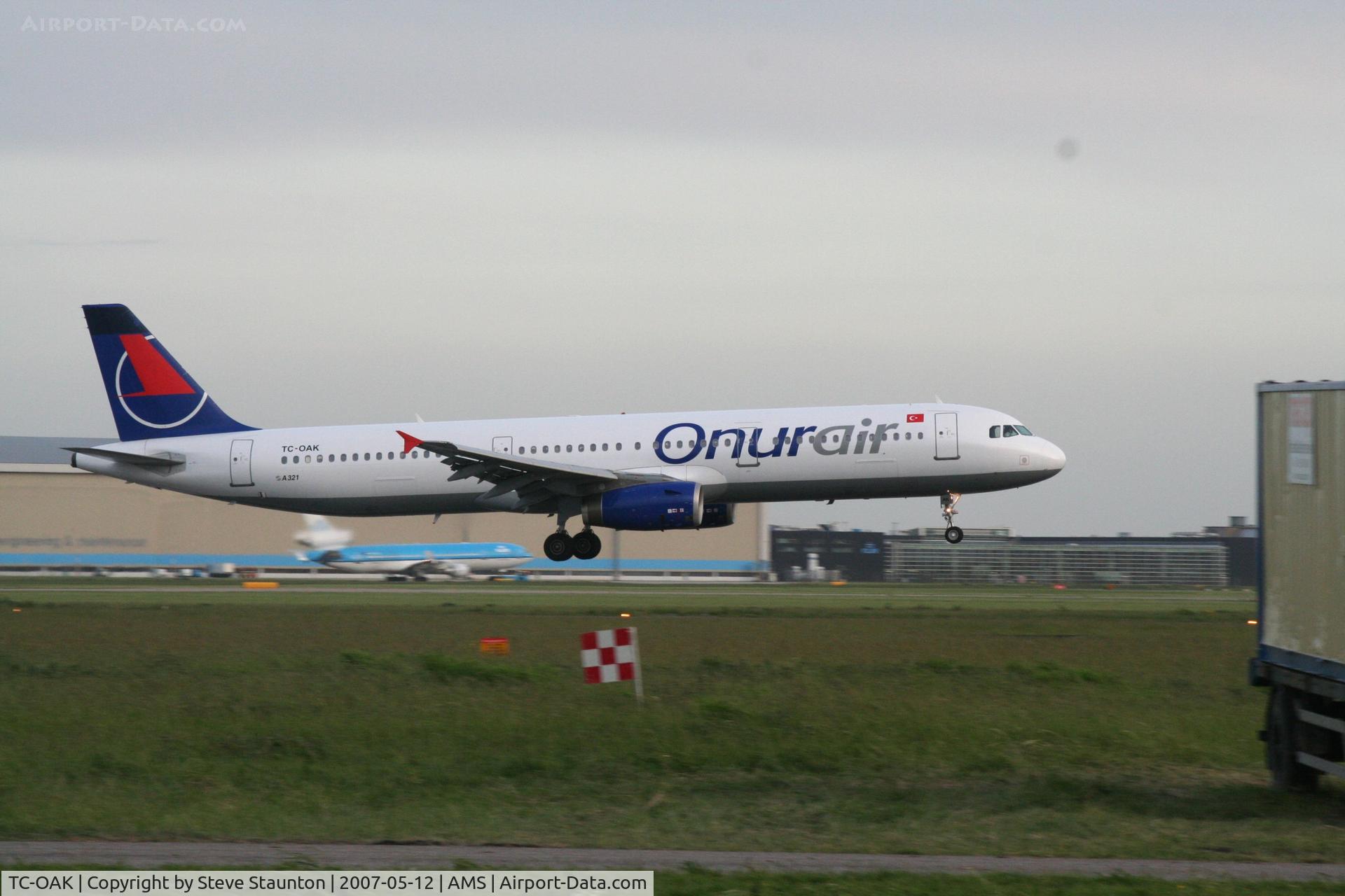 TC-OAK, 1999 Airbus A321-231 C/N 954, Taken on a gloomy evening at Schipol
