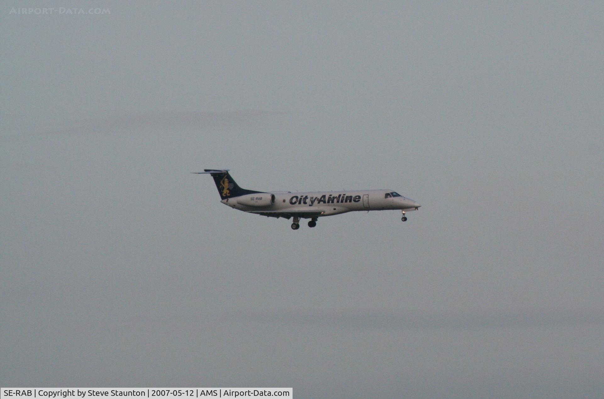 SE-RAB, 2001 Embraer ERJ-135LR (EMB-135LR) C/N 145453, Taken on a gloomy evening @ Schipol
