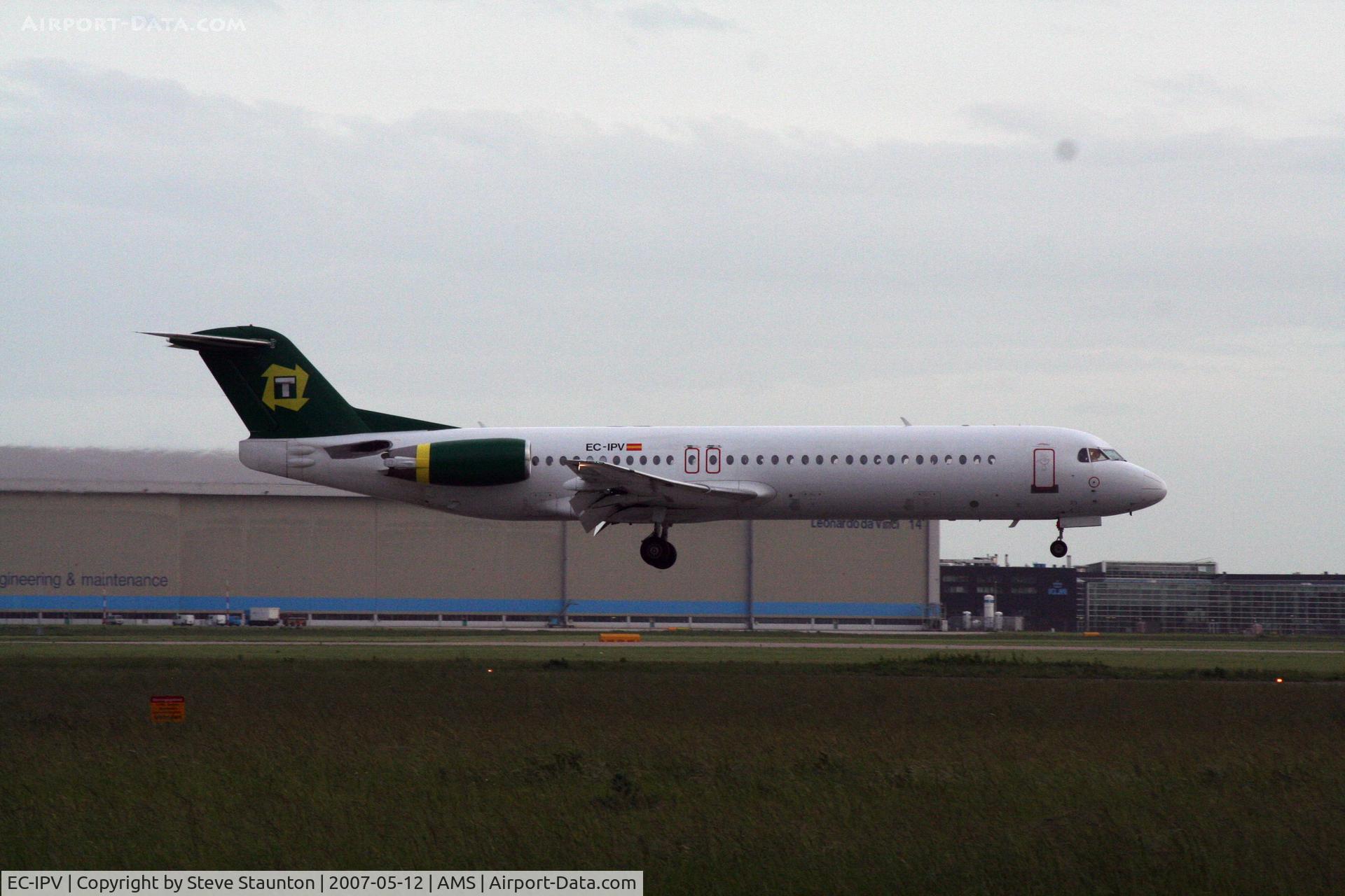 EC-IPV, 1993 Fokker 100 (F-28-0100) C/N 11451, Taken on a gloomy evening @ Schipol