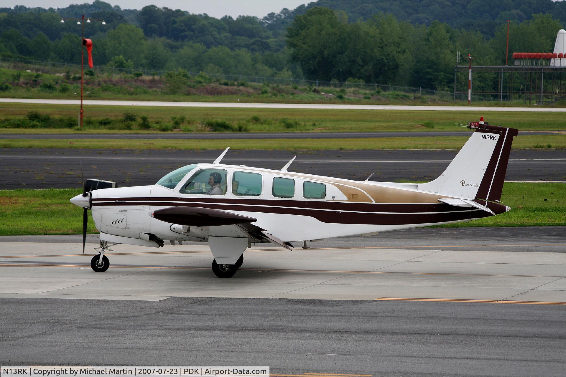 N13RK, 1978 Beech A36 Bonanza 36 C/N E-1238, Taxing to Epps Air Service