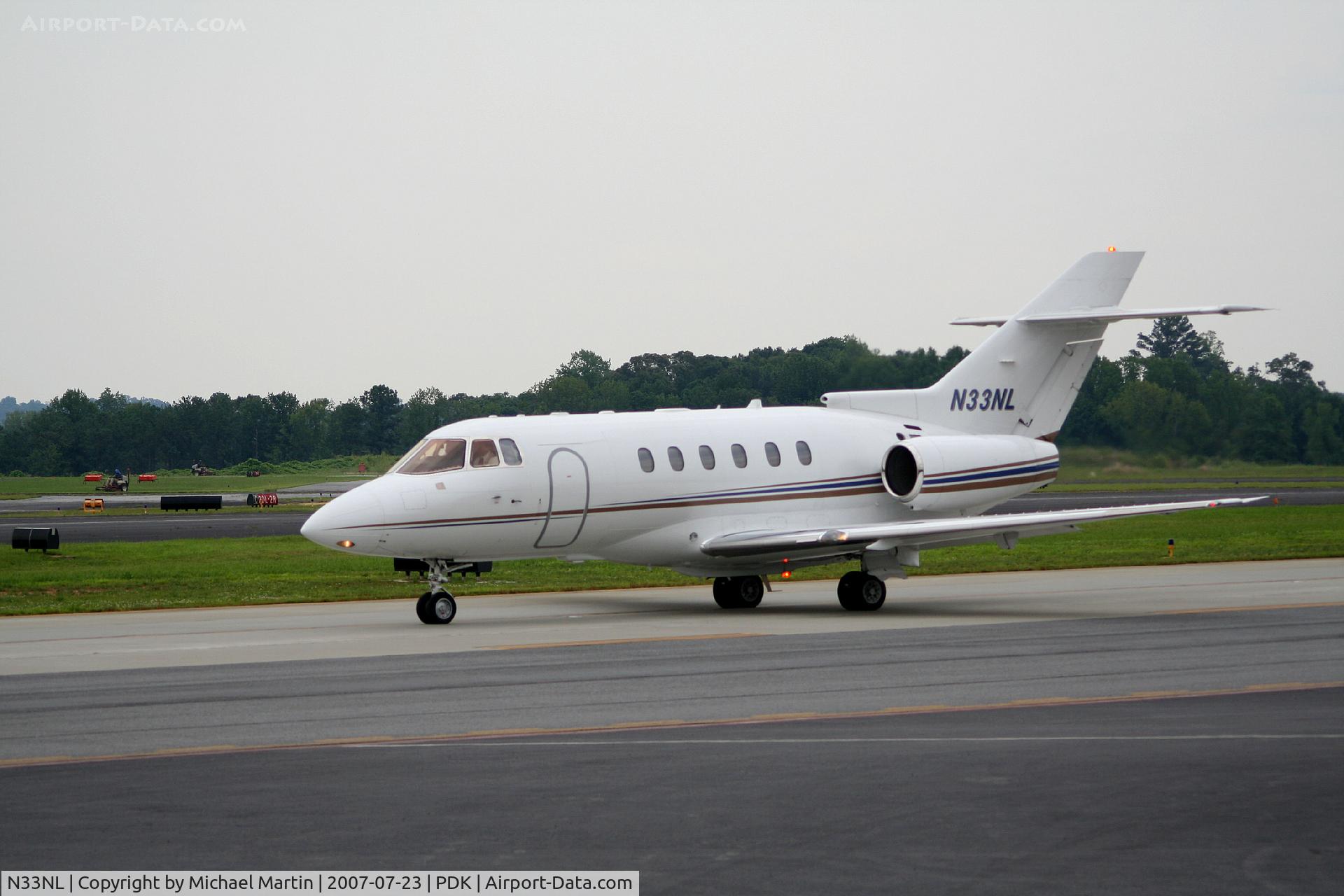 N33NL, 2003 Raytheon Hawker 800XP C/N 258643, Taxing to Epps Air Service