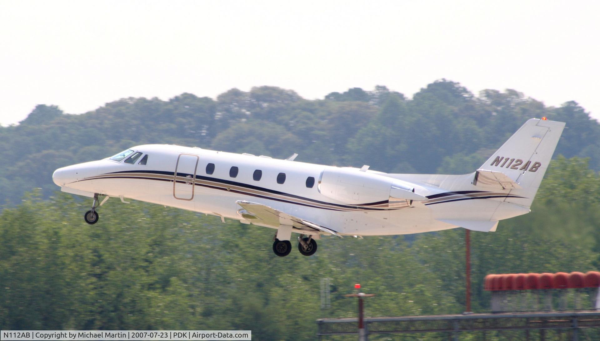 N112AB, 2004 Cessna 560XL C/N 560-5361, Departing PDK enroute to GON