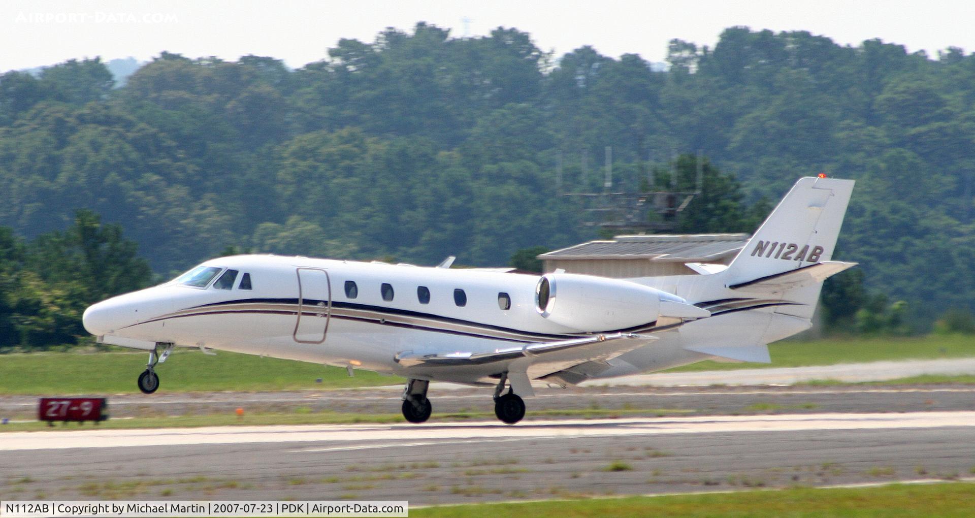 N112AB, 2004 Cessna 560XL C/N 560-5361, Taking off from Runway 20R