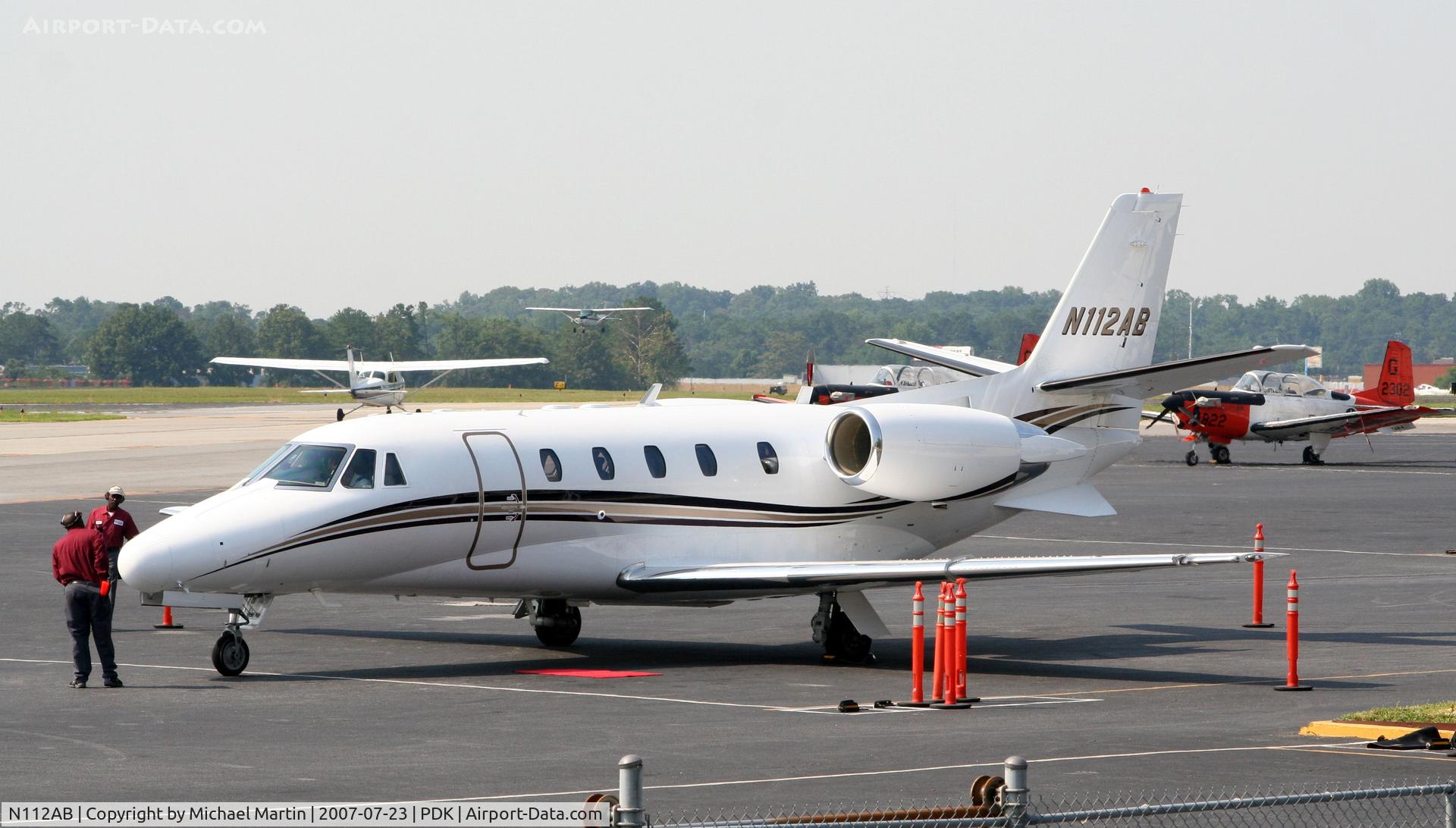 N112AB, 2004 Cessna 560XL C/N 560-5361, On Ramp At Mercury Air Center