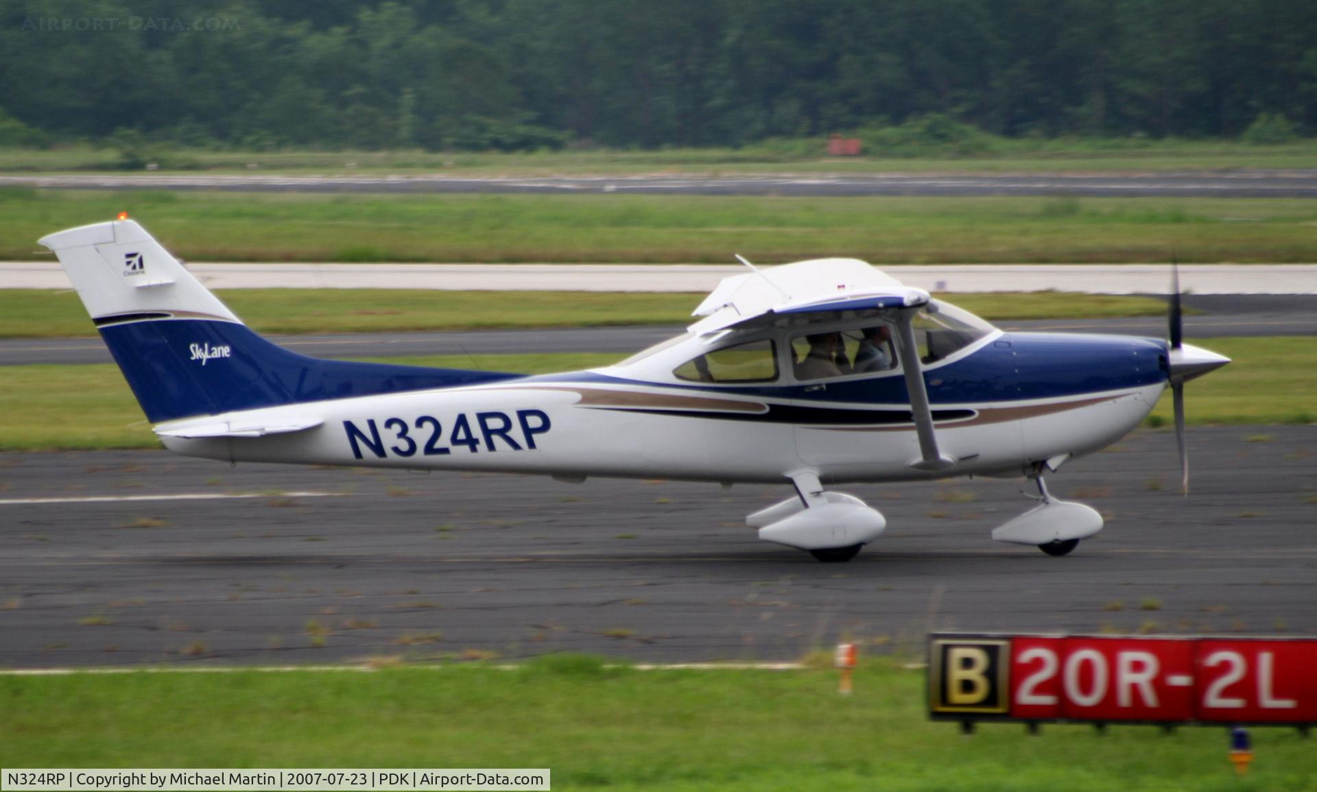 N324RP, 2004 Cessna 182T Skylane C/N 18281422, Taking off from Runway 20R