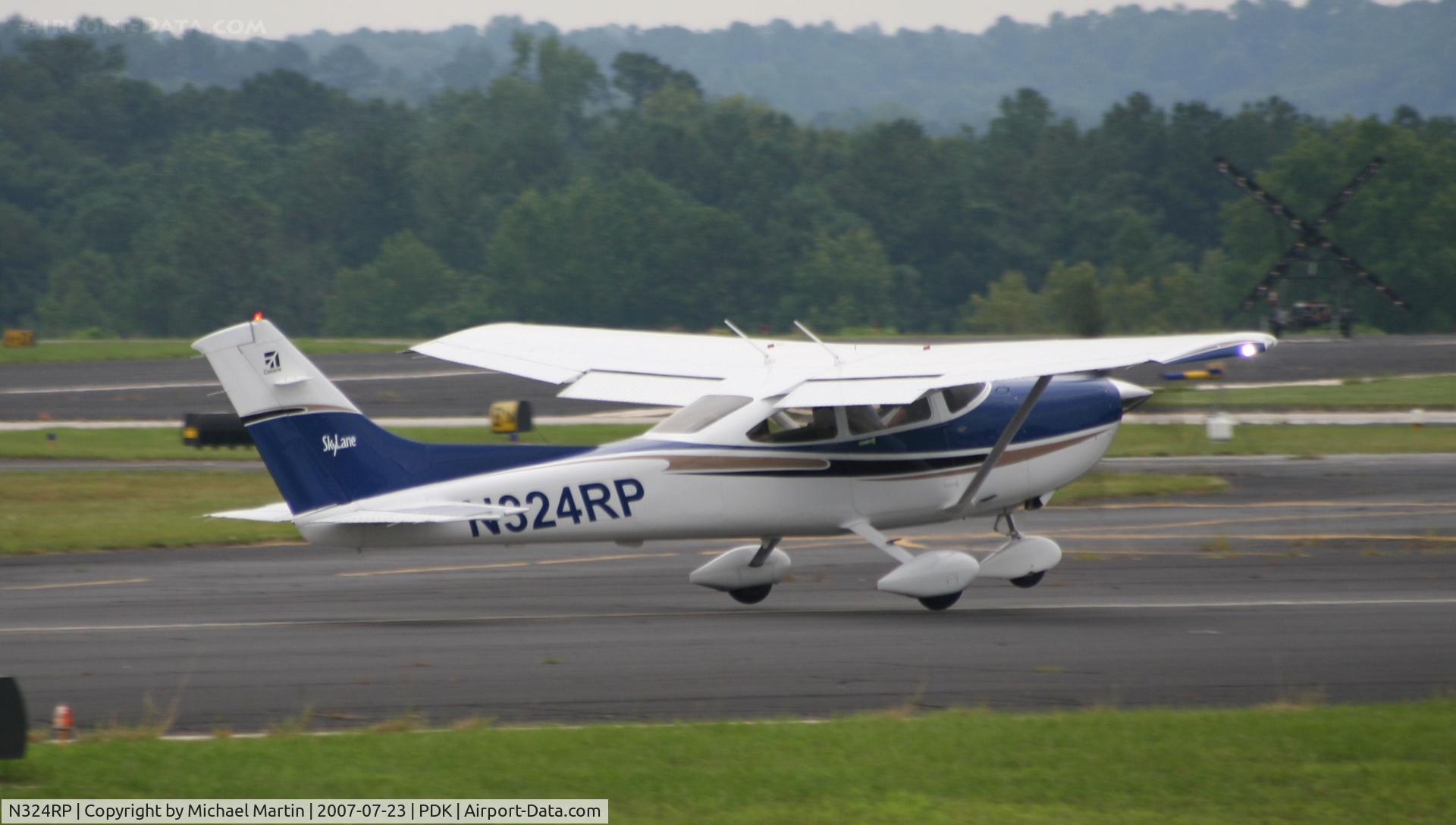 N324RP, 2004 Cessna 182T Skylane C/N 18281422, Departing PDK enroute to TCL