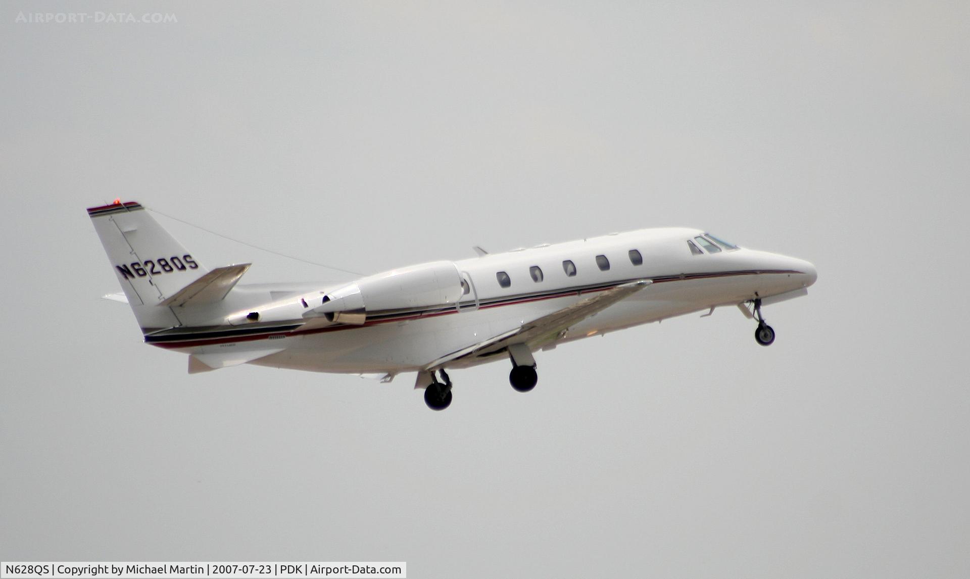 N628QS, 2002 Cessna 560XL C/N 560-5305, Departing PDK enroute to VRB
