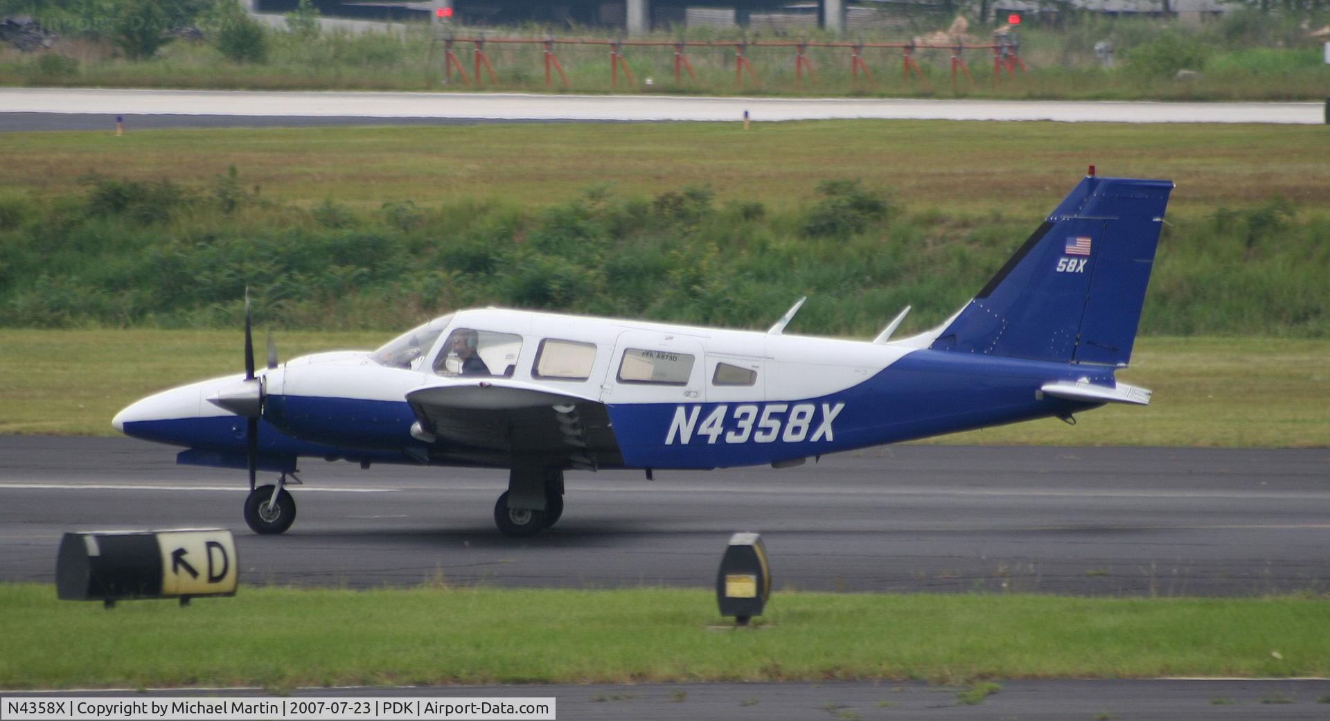 N4358X, 1975 Piper PA-34-200T C/N 34-7670027, Taxing to Signature Flight Services