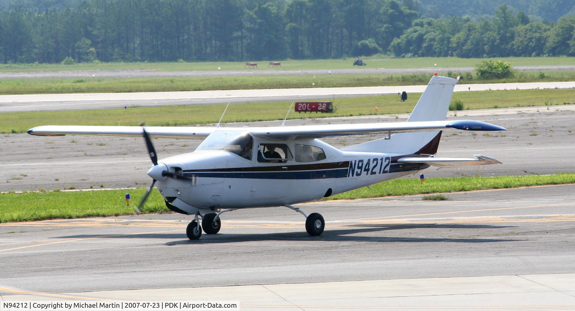N94212, 1974 Cessna 210L Centurion C/N 21060543, Taxing to Epps Air Service