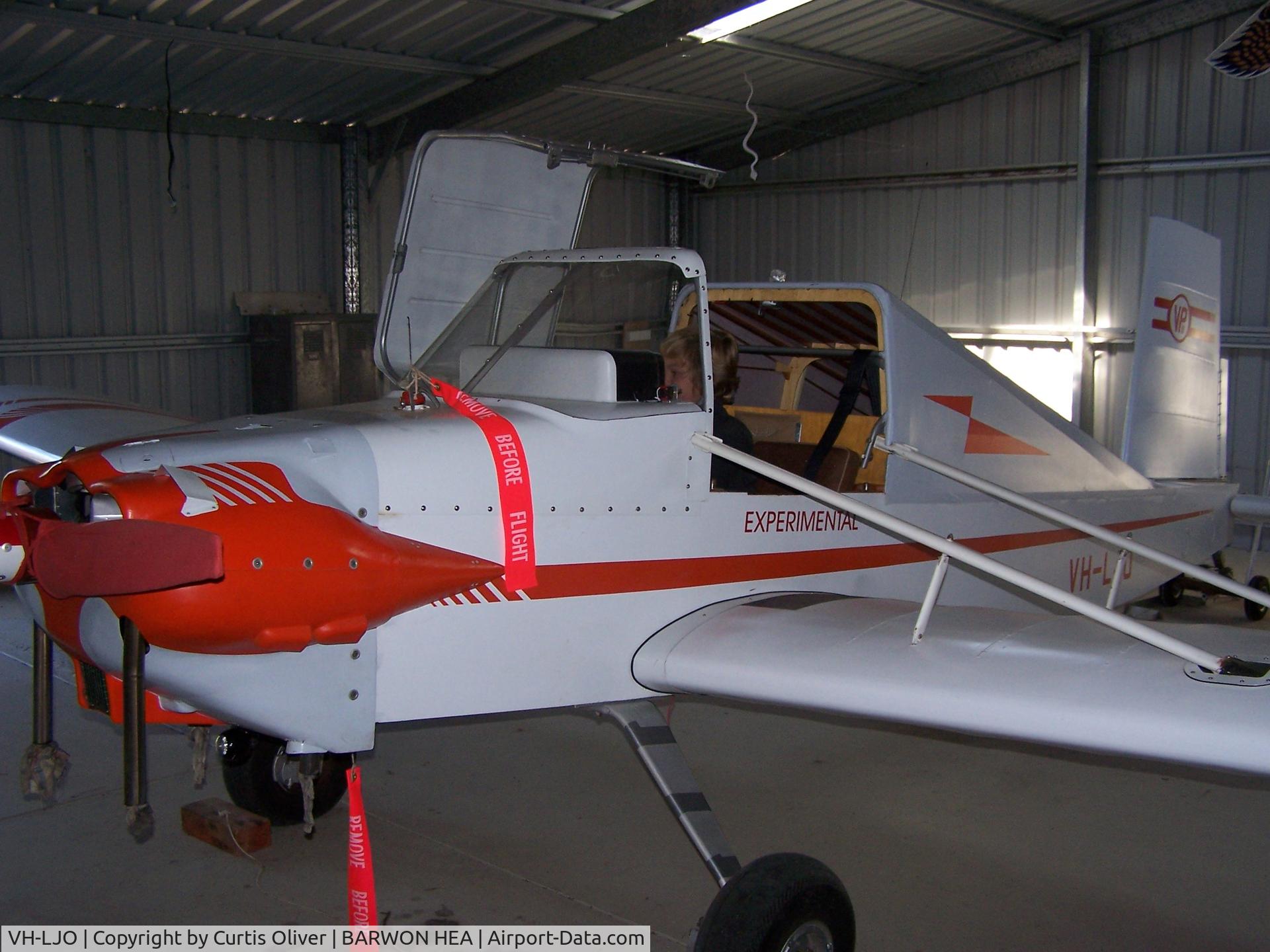 VH-LJO, 1994 Evans VP-2 Volksplane C/N V267, Photo of Gandson in Aircraft in the Hanger