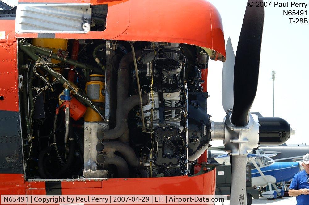 N65491, North American T-28B Trojan C/N 200-316 (138245), The R-1820's engine bay.  But where is the NAPA filter??  At least the Fram matches her colors