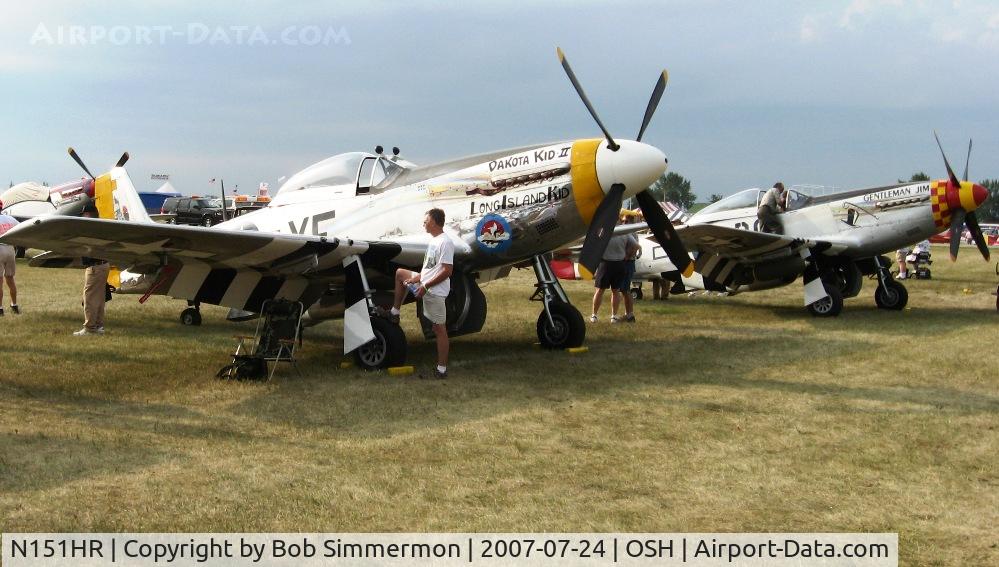 N151HR, 1945 North American P-51D Mustang C/N 12241064, N151HR and N551J in the Mustang pen at Airventure '07