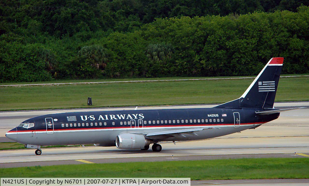 N421US, 1989 Boeing 737-401 C/N 23988, Taxiing in off 36L