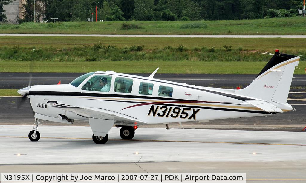 N3195X, 1999 Raytheon Aircraft Company A36 Bonanza C/N E-3295, @PDK