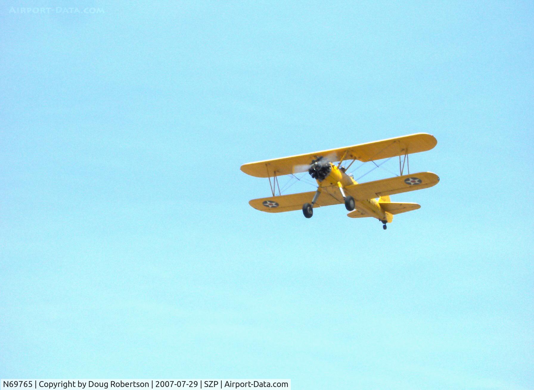 N69765, 1941 Boeing A75N1 (PT17) C/N 75-1044, 1941 Boeing Stearman A75N1 (PT-17 KAYDET) as N2S-1, Continental W670-5 220 Hp, climbout from Rwy 22