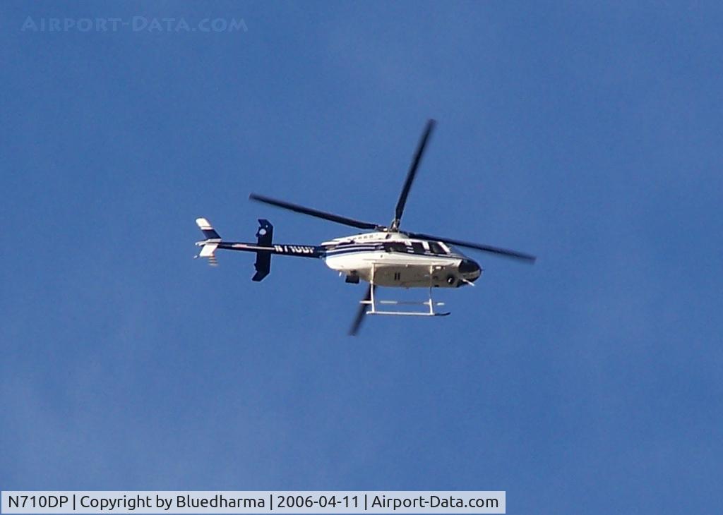 N710DP, 1998 Bell 407 C/N 53249, Patrol over Columbine High School area.