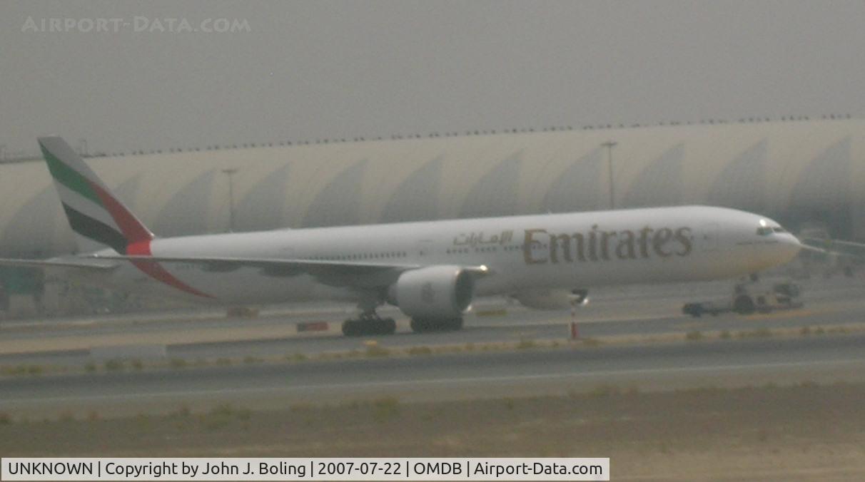 UNKNOWN, , Emirates Boeing 777-300 under tow at Dubai