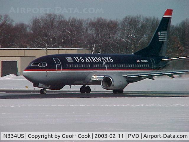 N334US, 1985 Boeing 737-301 C/N 23231, Brrrr! Snow! N334US B737-300 with US Airways ready to depart PVD after a midwinter snowfall!