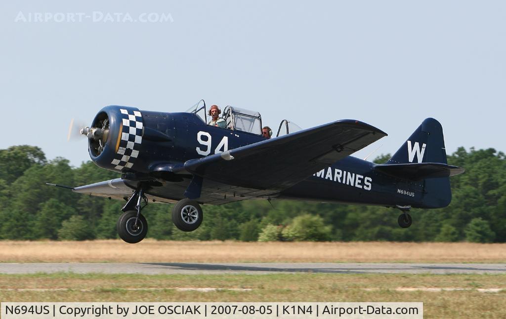 N694US, 1943 North American SNJ-4 Texan C/N 88-13627, Taking off from Woodbine.
