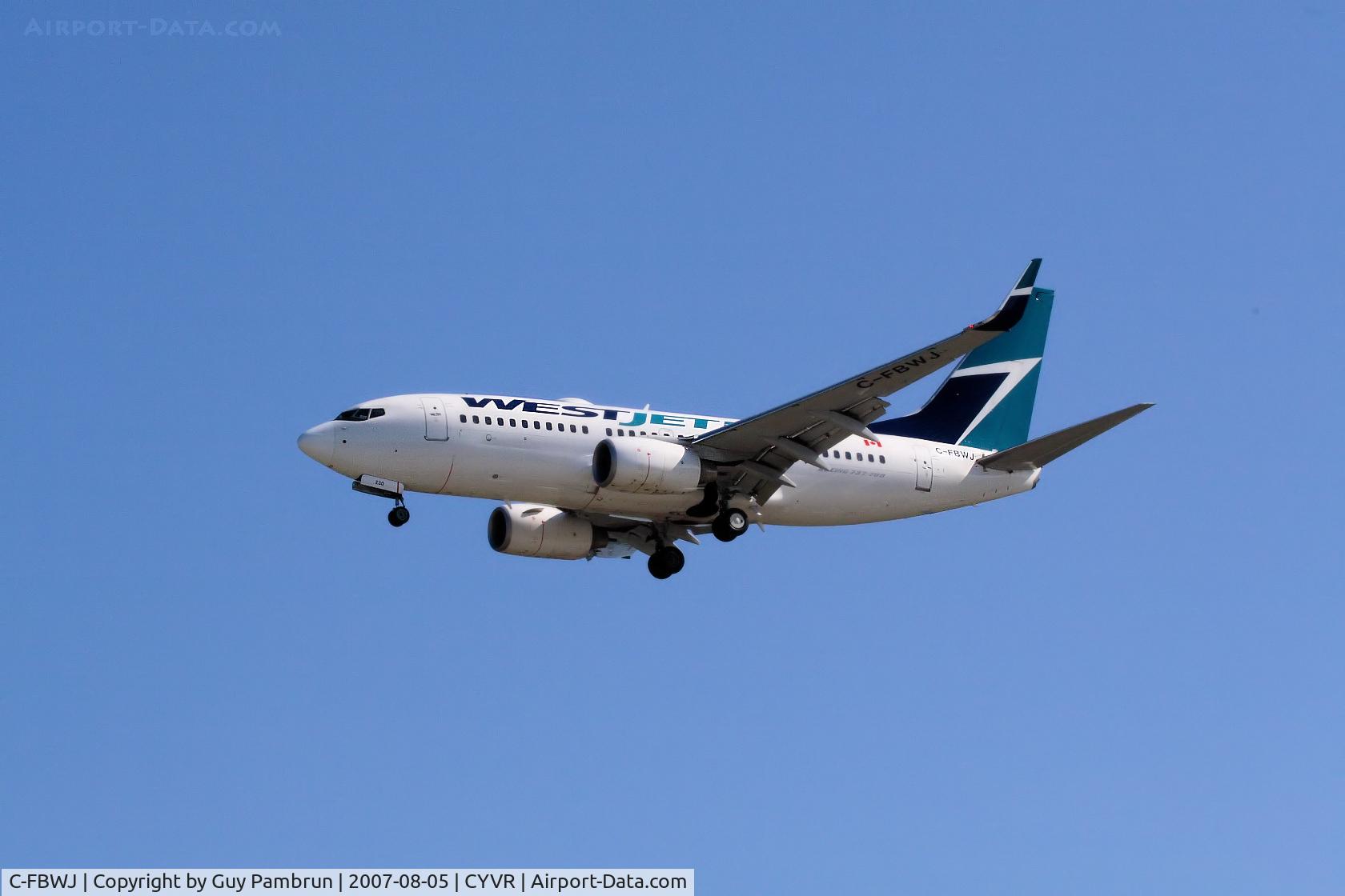C-FBWJ, 2005 Boeing 737-7CT C/N 32767, About to touch down