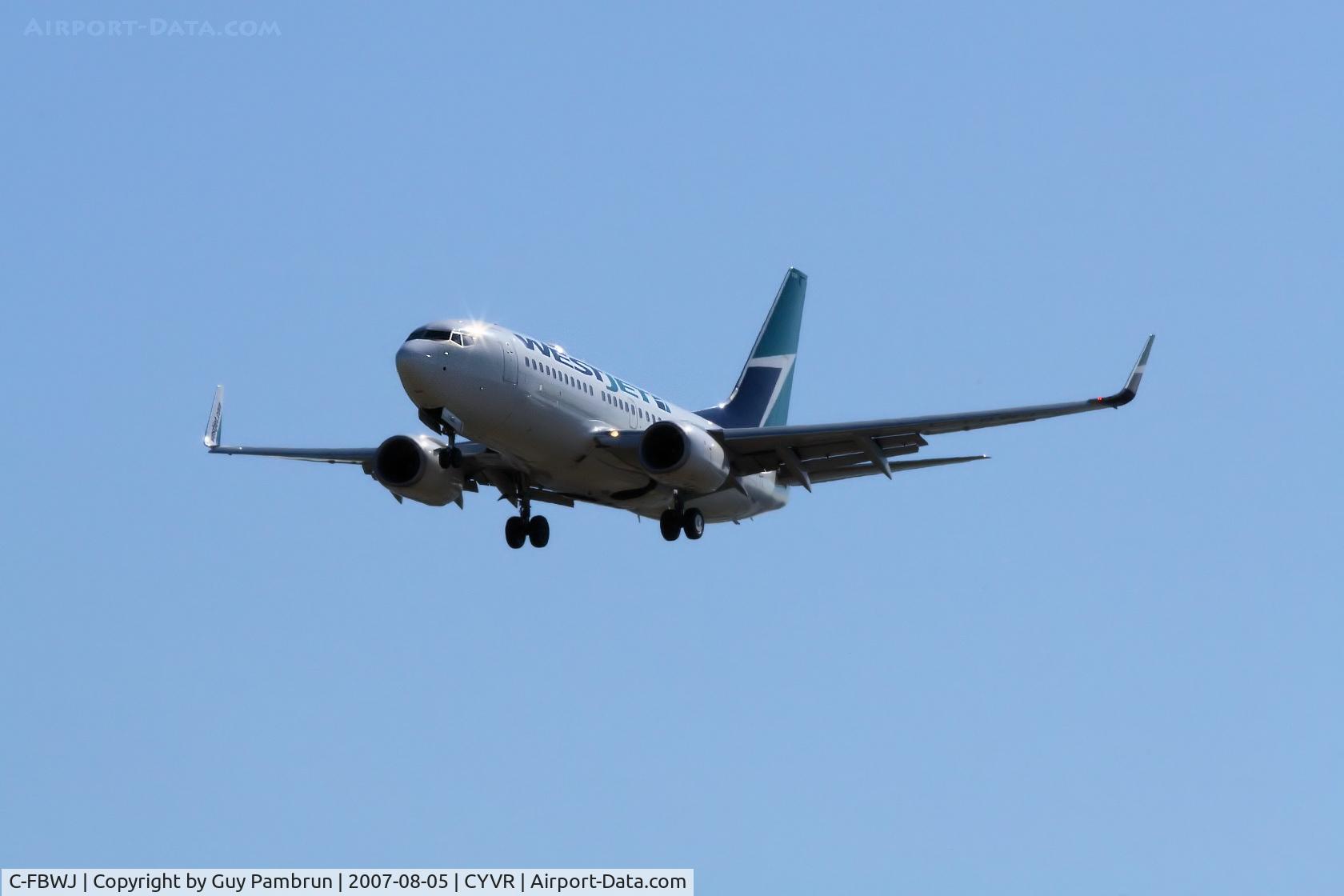 C-FBWJ, 2005 Boeing 737-7CT C/N 32767, About to touch down