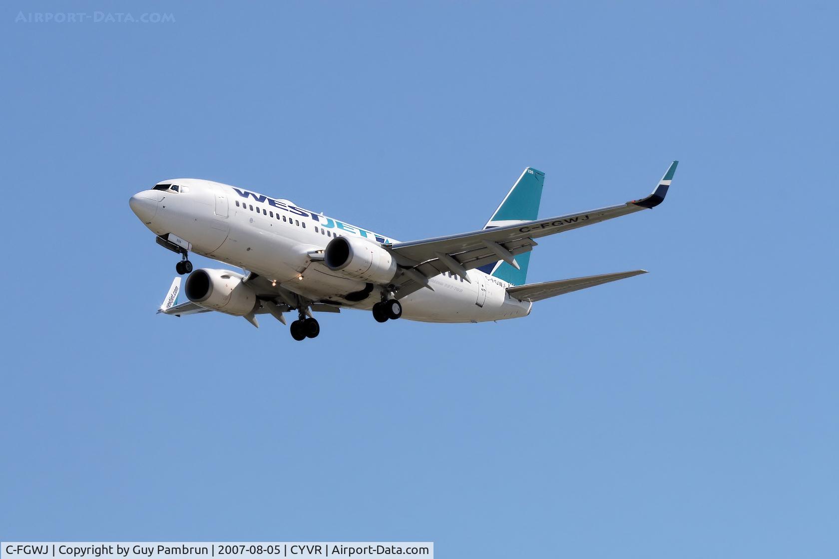 C-FGWJ, 2004 Boeing 737-7CT C/N 32764, About to touch down
