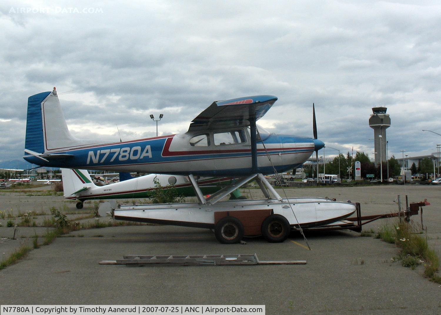N7780A, 1957 Cessna 180A C/N 32677, General Aviation Parking area at Anchorage International