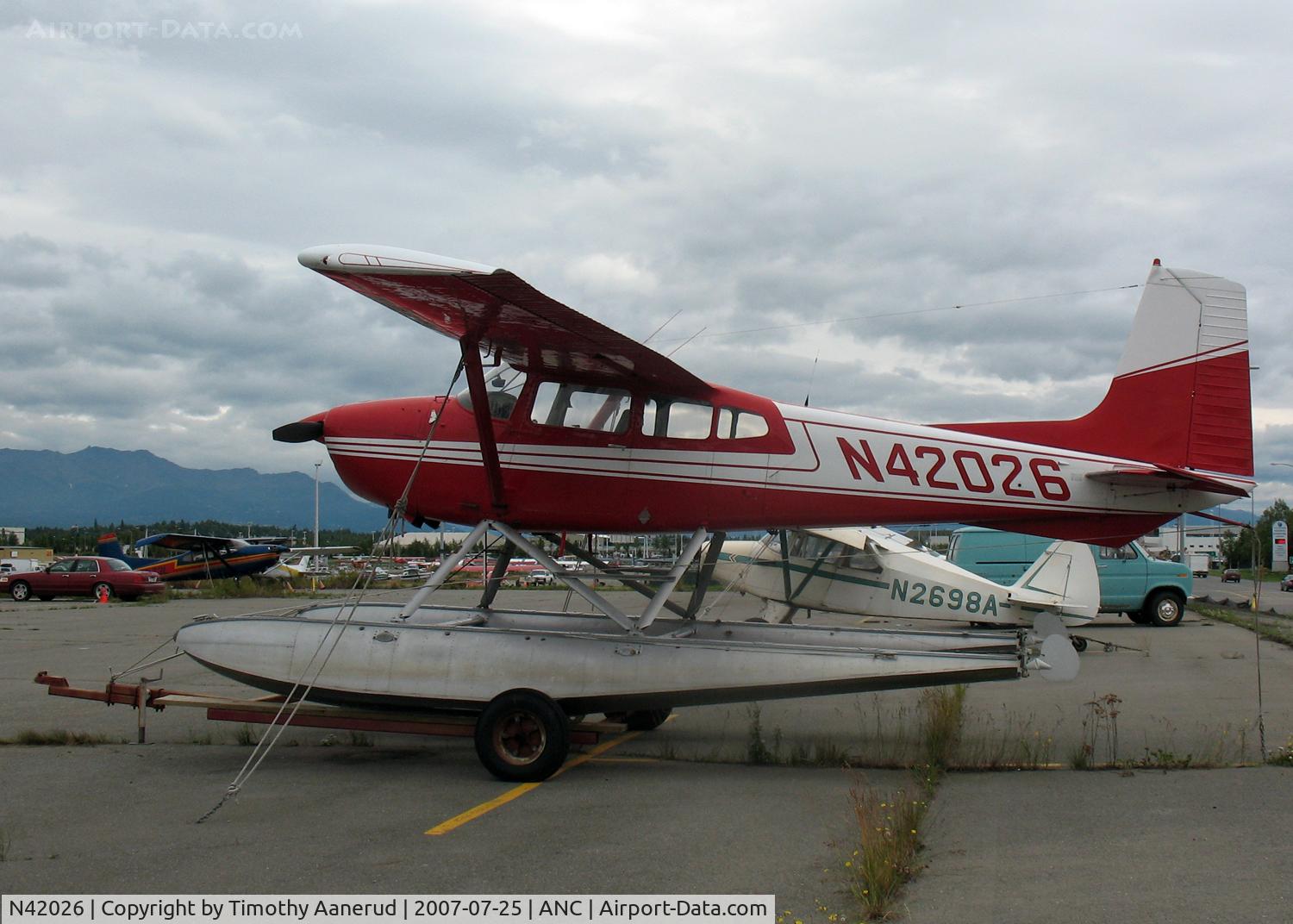 N42026, 1972 Cessna 180J C/N 18052302, General Aviation Parking area at Anchorage International