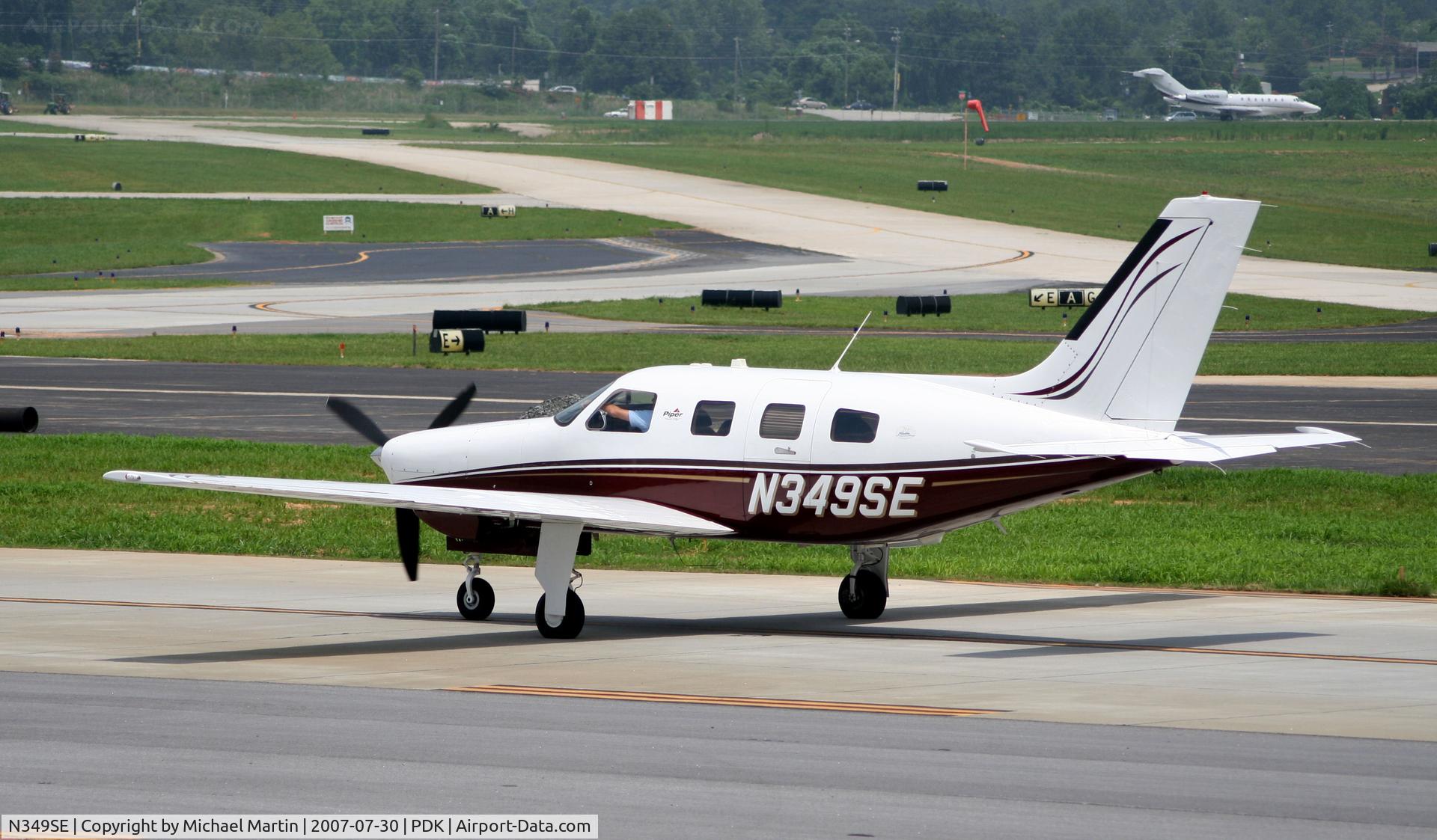 N349SE, 2004 Piper PA-46-350P Malibu Mirage C/N 4636349, Taxing back from flight