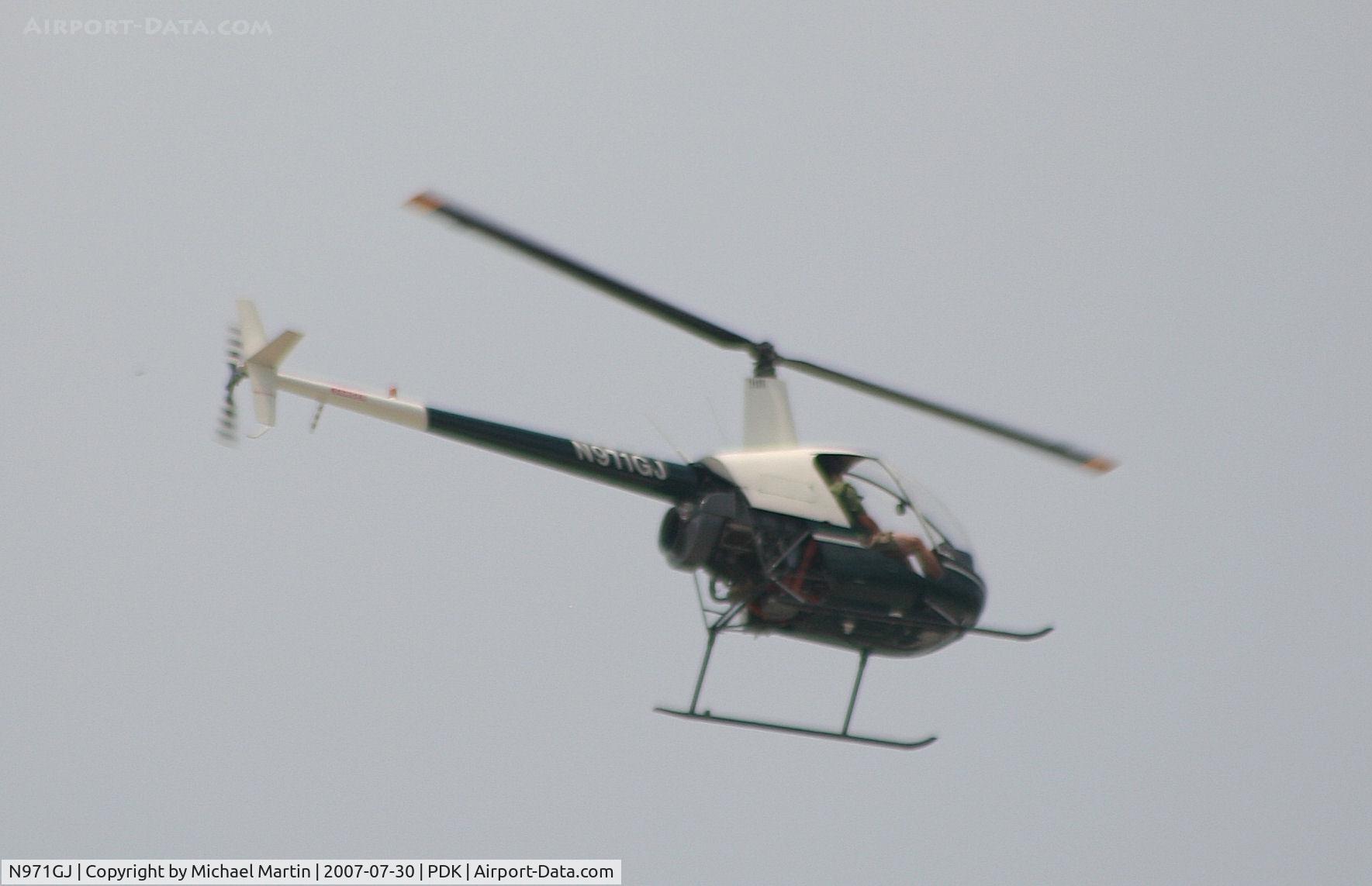N971GJ, 1991 Robinson R22 BETA C/N 1934, Over flying PDK