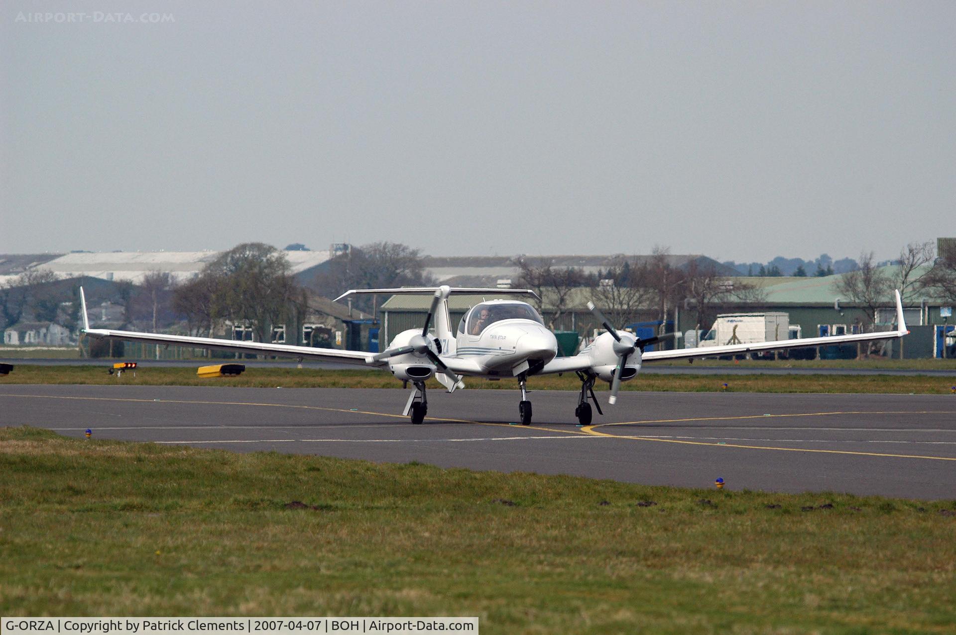 G-ORZA, 2005 Diamond DA-42 Twin Star C/N 42.062, TAXIING TO PARK