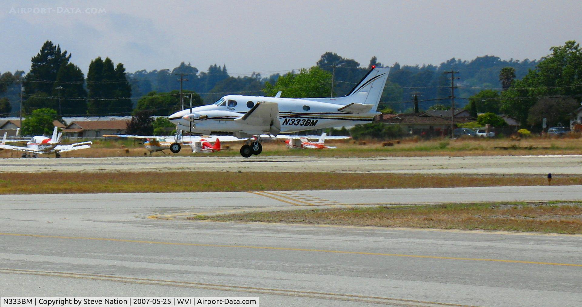 N333BM, 1997 Raytheon Aircraft Company C90A C/N LJ-1504, EFS Charter Service 1997 Raytheon Aircraft Company C90A touching down @ Watsonville, CA airshow
