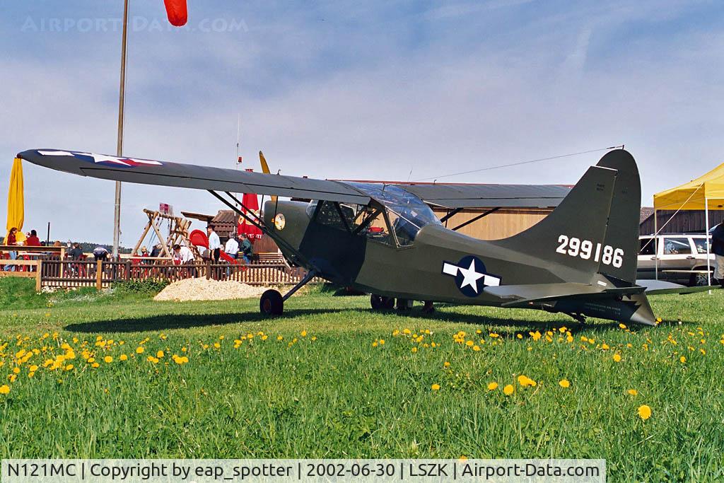 N121MC, 1944 Stinson L-5 Sentinel C/N 761684, parked waiting for pax
