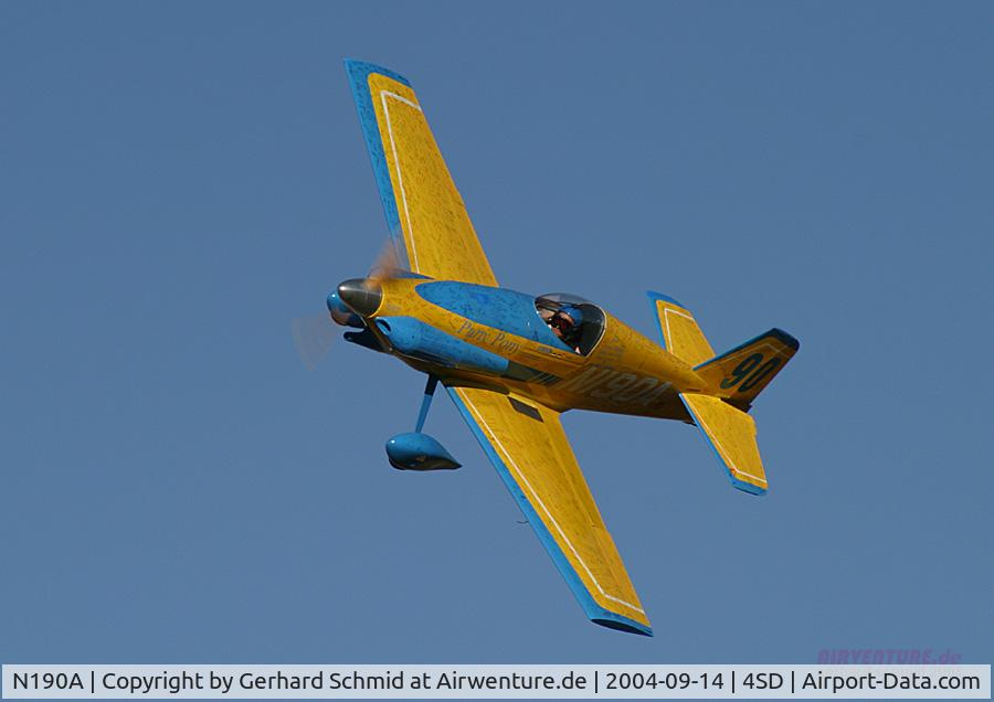 N190A, 1969 Mustang Aeronautics Midget Mustang AGQ C/N AGQ-6, shown while on the race course at the National Air Races.  If you look closely, you will be able to see the signatures gathered from fans by the owner.