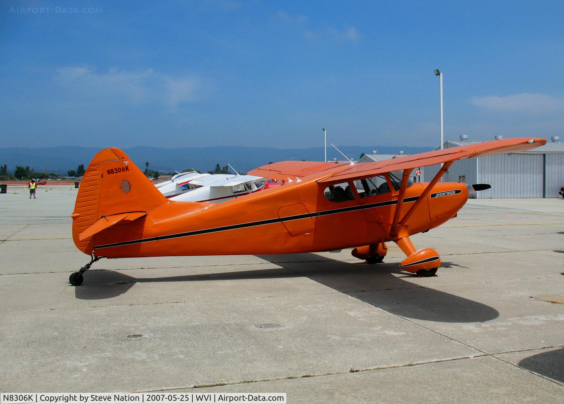 N8306K, 1946 Stinson 108 Voyager C/N 108-1306, Locally-based bright orange 1946 Stinson 108 glowing in the sun @ Watsonville, CA airshow