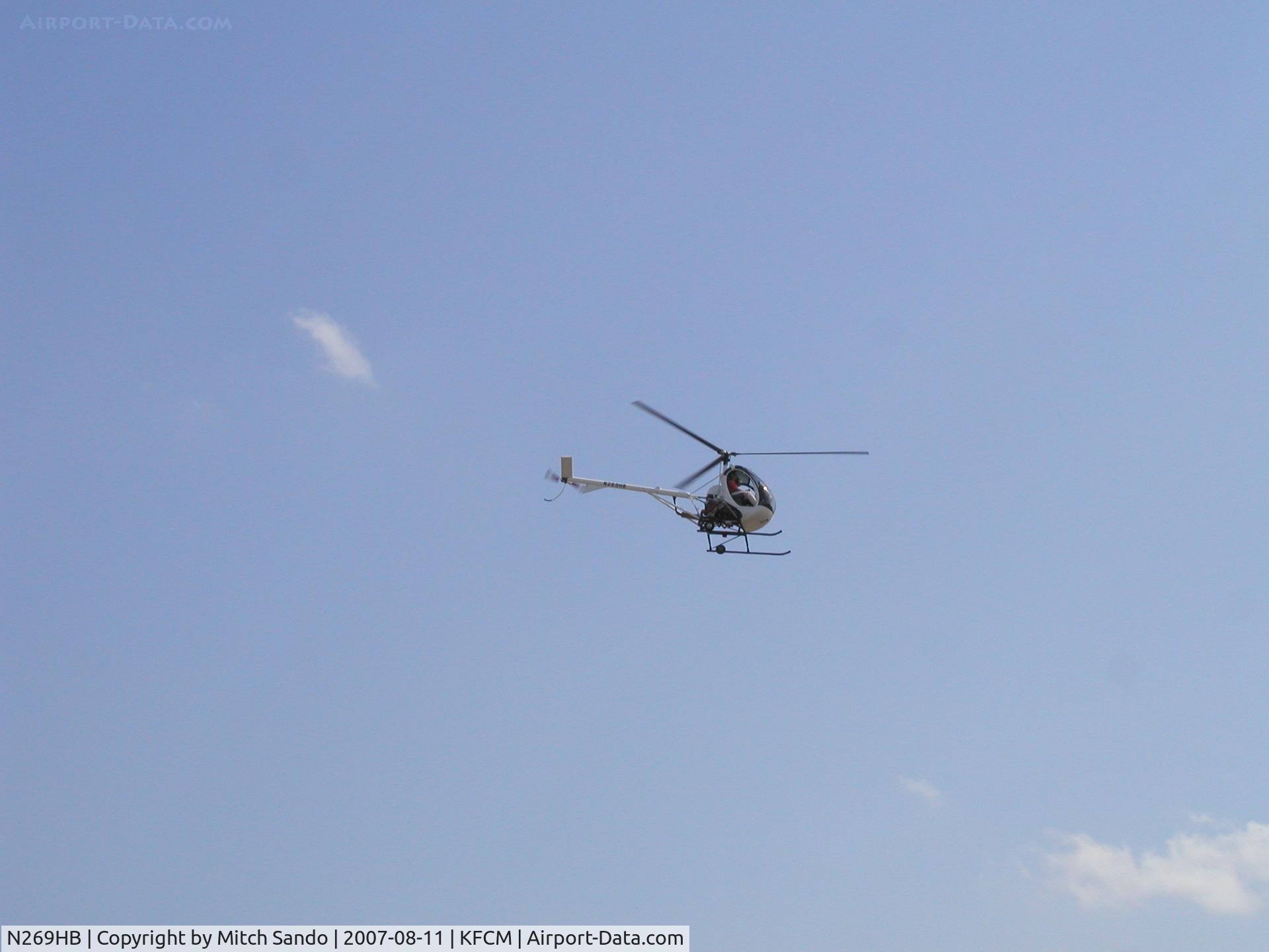 N269HB, 2004 Schweizer 269C-1 C/N 0166, Taking off Runway 28R.