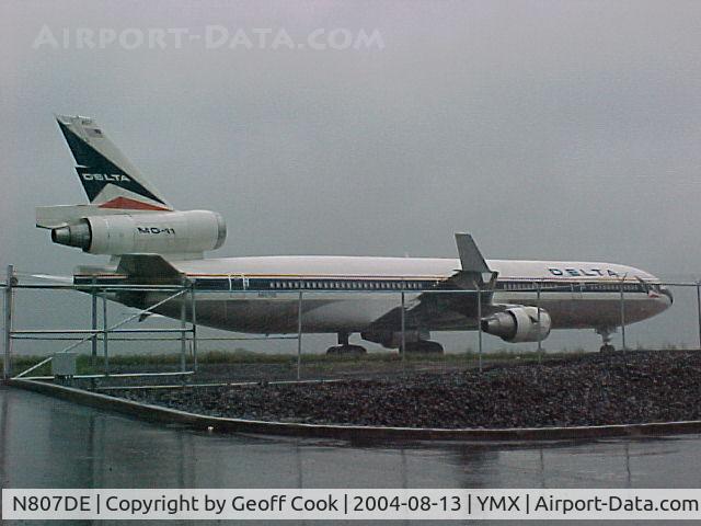 N807DE, 1992 McDonnell Douglas MD-11F C/N 48478, The pouring rain adding to the gloom at Montreal's Mirabel Airport N807DE sits forlorn in store waiting for her return to the skies!