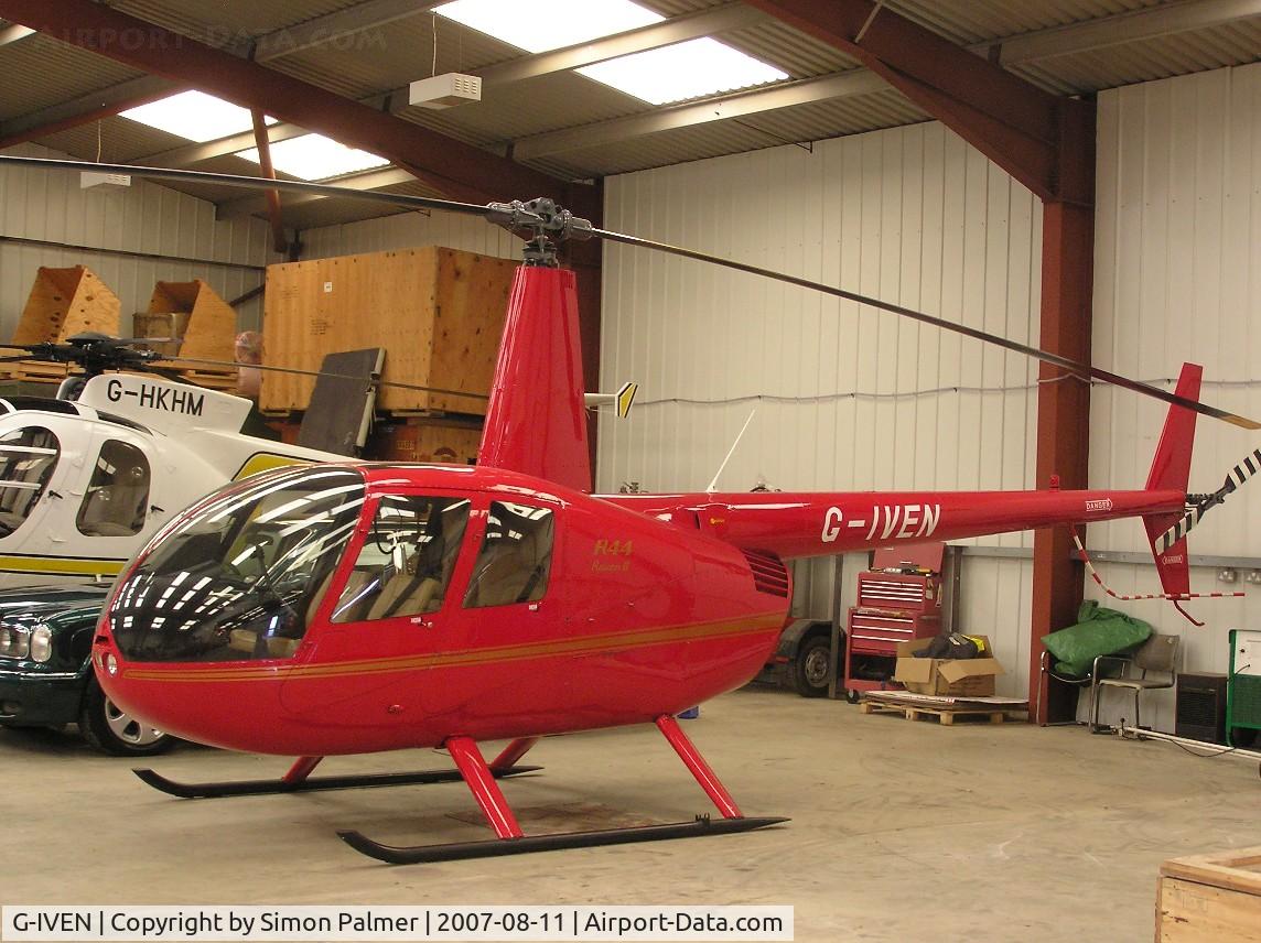 G-IVEN, 2004 Robinson R44 Raven II C/N 10442, R44 II in the hangar at Wellesbourne