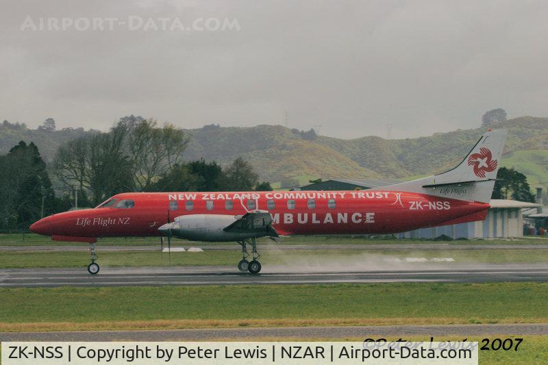 ZK-NSS, Fairchild SA-227AC Metro III C/N AC692, landing roll, in wet weather