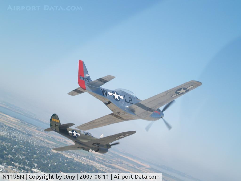 N1195N, 1942 Curtiss P-40N Warhawk C/N 130158, P-40N and a P-51 in formation